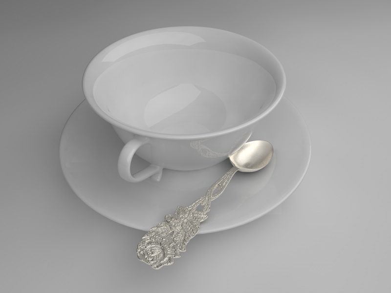 Tasse mit Silberlöffel